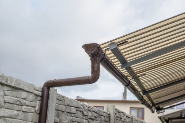 Plastic Downspout Installation in Arvada